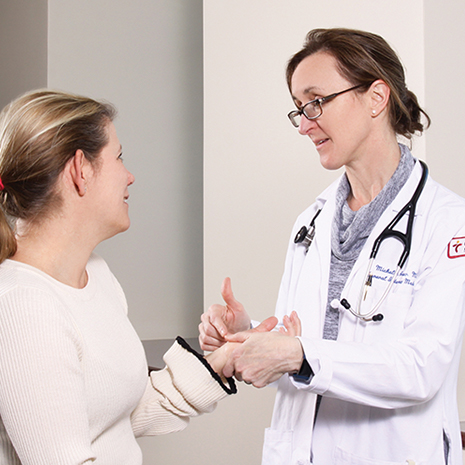 Brown Medicine patient with doctor photo